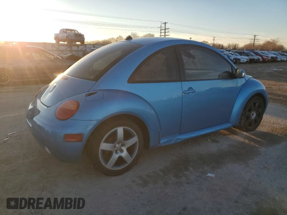 2004 Volkswagen New Beetle Coupe Satellite Blue with VIN 3VWGK31CX4M419900, listed as a Copart auction lot 41627155 with 129,510 mi miles and Salvage Title. Bid and sale history available at carsss.com. Image 3.
