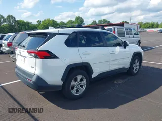 2020 Toyota RAV4 XLE with VIN 2T3W1RFV2LW068363, listed as a IAAI auction lot 42456921 with 125,014 mi miles and . Bid and sale history available at DreamBid. Image 4.