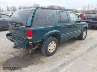 1997 Oldsmobile Bravada with VIN 1GHDT13W2V2706505, listed as a IAAI auction lot 41835475 with 131,247 mi miles. Bid and sale history available at carsss.com. Image 4.