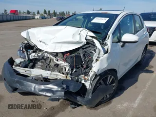 2018 Honda Fit EX-L with VIN 3HGGK5H90JM727180, listed as a IAAI auction lot 41610155 with 180,020 mi miles. Bid and sale history available at carsss.com. Image 2.