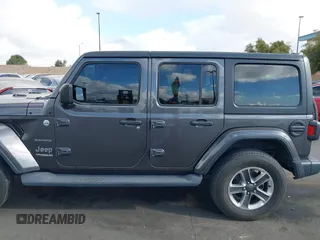 2021 Jeep Wrangler Unlimited Sahara with VIN 1C4HJXEN4MW503014, listed as a IAAI auction lot 41900234 with 16,444 mi miles and . Bid and sale history available at DreamBid. Image 14.