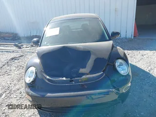 2005 Volkswagen New Beetle Coupe GL with VIN 3VWBK31C25M413925, listed as a IAAI auction lot 39823280 with 72,382 mi miles. Bid and sale history available at carsss.com. Image 12.