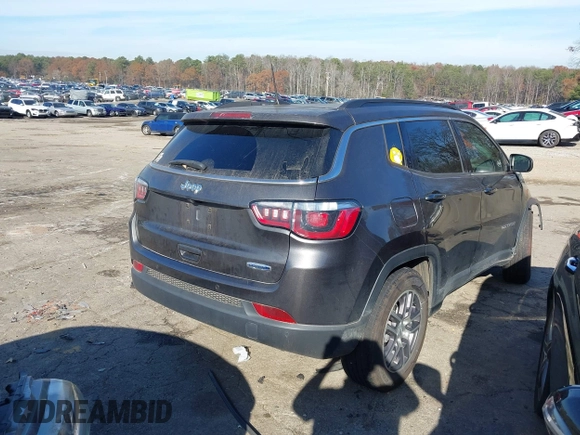 2020 Jeep Compass Latitude w/Sun/Safety Pkg with VIN 3C4NJCBB2LT241780, listed as a IAAI auction lot 41118805 with 74,891 mi miles. Bid and sale history available at carsss.com. Image 4.