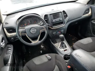 2015 Jeep Cherokee Sport with VIN 1C4PJLAB7FW517637, listed as a Copart auction lot 61385945 with 158,956 mi miles and Salvage title. Bid and sale history available at DreamBid. Image 8.