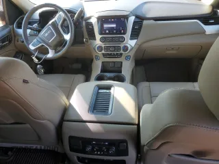 2015 GMC Yukon SLT with VIN 1GKS1BKCXFR563509, listed as a Copart auction lot 77188854 with 127,481 mi miles and Clean Title. Bid and sale history available at carsss.com. Image 8.