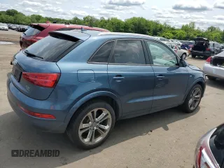2018 Audi Q3 Premium z VIN WA1ECCFS8JR009981, wystawiony jako Copart lot #58785255 z przebiegiem 85 586 mil mil oraz Szkody całkowita. Historia ofert i sprzedaży dostępna na DreamBid. Obrazek 3.