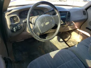 1998 Ford F-150 с VIN 1FTZF1729WKB49667, выставлен на аукционе Copart как лот 85818164 с пробегом 332 208 миль миль и Списание • Salvage title. История ставок и продаж доступна на DreamBid. Изображение 8.