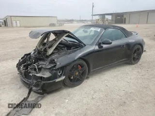2009 Porsche 911 Carrera S with VIN WP0CB29959S755831, listed as a Copart auction lot 47064005 with 114,522 mi miles and Salvage title. Bid and sale history available at DreamBid. Image 1.