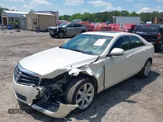 2014 Cadillac ATS Standard RWD with VIN 1G6AA5RA6E0171128, listed as a IAAI auction lot 42226859 with 90,308 mi miles and . Bid and sale history available at DreamBid. Image 6.