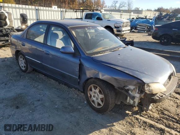 2004 Kia Spectra z VIN KNAFB121045315435, wystawiony jako Copart lot #83082084 z przebiegiem 94 974 mil mil oraz Czysty tytuł • Clean title. Historia ofert i sprzedaży dostępna na DreamBid. Obrazek 4.