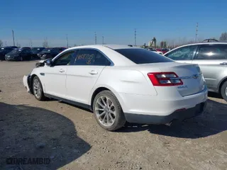 2013 Ford Taurus Limited with VIN 1FAHP2F84DG166824, listed as a IAAI auction lot 41887725 with 119,864 mi miles. Bid and sale history available at carsss.com. Image 3.