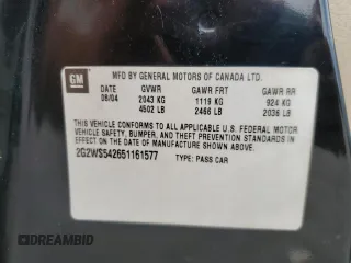 2005 Pontiac Grand Prix z VIN 2G2WS542651161577, wystawiony jako Copart lot #56522945 z przebiegiem 241 430 mil mil oraz Szkody całkowita. Historia ofert i sprzedaży dostępna na DreamBid. Obrazek 12.