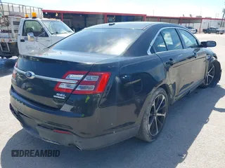 2014 Ford Taurus SEL with VIN 1FAHP2E8XEG133992, listed as a IAAI auction lot 42223678 with 201,204 mi miles and . Bid and sale history available at carsss.com. Image 4.