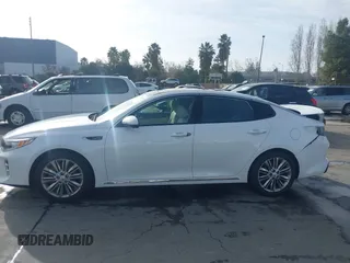 2016 Kia Optima SXL Turbo with VIN 5XXGV4L20GG074869, listed as a IAAI auction lot 41212808 with 82,884 mi miles. Bid and sale history available at carsss.com. Image 15.
