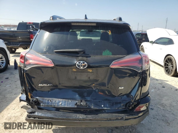2017 Toyota RAV4 SE with VIN JTMNFREV7HJ142221, listed as a Copart auction lot 86334074 with 123,165 mi miles and Salvage title. Bid and sale history available at DreamBid. Image 6.