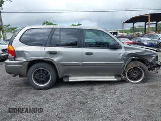 2005 GMC Envoy SLT z VIN 1GKDS13S152161472, wystawiony jako IAAI lot #40110978 z przebiegiem 141 908 mil mil oraz . Historia ofert i sprzedaży dostępna na DreamBid. Obrazek 14.