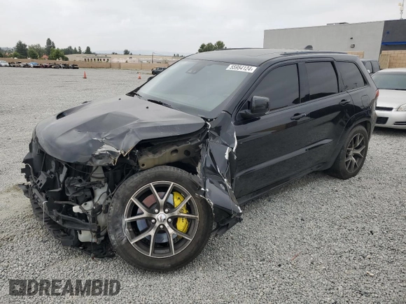2017 Jeep Grand Cherokee SRT with VIN 1C4RJFDJ1HC904654, listed as a Copart auction lot 55954124 with 82,507 mi miles and Salvage Title. Bid and sale history available at carsss.com. Image 1.