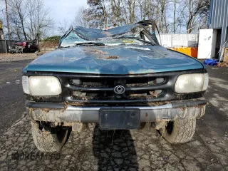 1994 Mazda B-Series Truck LE z VIN 4F4DR17X5RTN10704, wystawiony jako Copart lot #87230804 z przebiegiem 227 476 mil mil oraz Szkoda całkowita • Salvage title. Historia ofert i sprzedaży dostępna na DreamBid. Obrazek 5.