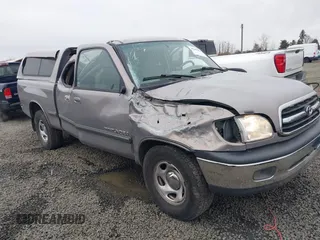 2000 Toyota Tundra SR5 with VIN 5TBRT3414YS086059, listed as a IAAI auction lot 41609962 with 105,030 mi miles and . Bid and sale history available at carsss.com. Image 1.
