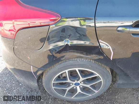 2015 Ford Focus SE with VIN 1FADP3K26FL320689, listed as a IAAI auction lot 42160904 with 95,136 mi miles and . Bid and sale history available at DreamBid. Image 6.