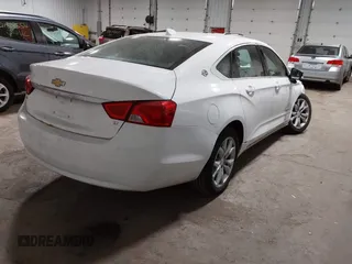 2018 Chevrolet Impala LT with VIN 1G1105S39JU135781, listed as a IAAI auction lot 41813394 with 100,747 mi miles and . Bid and sale history available at DreamBid. Image 4.