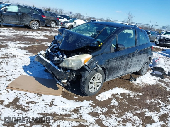 2012 Toyota Yaris L with VIN JTDJTUD33CD520102, listed as a IAAI auction lot 41621530 with 133,144 mi miles. Bid and sale history available at carsss.com. Image 18.