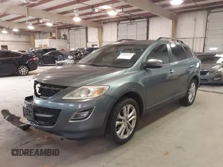 2012 Mazda CX-9 Grand Touring with VIN JM3TB3DV6C0360304, listed as a IAAI auction lot 41509627 with 163,986 mi miles. Bid and sale history available at carsss.com. Image 17.