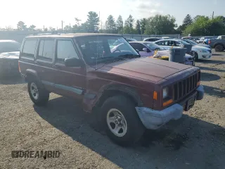 2000 Jeep Cherokee z VIN 1J4FF48S2YL135037, wystawiony jako Copart lot #66156505 z przebiegiem 72 433 mil mil oraz Szkoda całkowita • Salvage title. Historia ofert i sprzedaży dostępna na DreamBid. Obrazek 4.