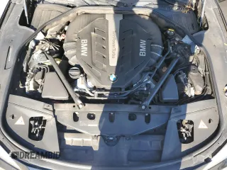 2015 BMW 7 Series 750i xDrive with VIN WBAYB6C57FD965993, listed as a Copart auction lot 83871924 with 76,720 mi miles and Salvage Title. Bid and sale history available at carsss.com. Image 11.