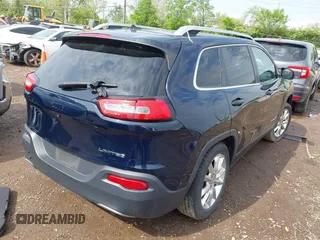 2015 Jeep Cherokee Limited with VIN 1C4PJLDBXFW658441, listed as a IAAI auction lot 42167135 with Not Provided miles and . Bid and sale history available at DreamBid. Image 4.
