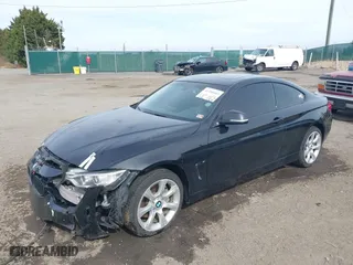 2014 BMW 4 Series 435i xDrive with VIN WBA3R5C54EK188957, listed as a IAAI auction lot 41790183 with 97,981 mi miles. Bid and sale history available at carsss.com. Image 2.