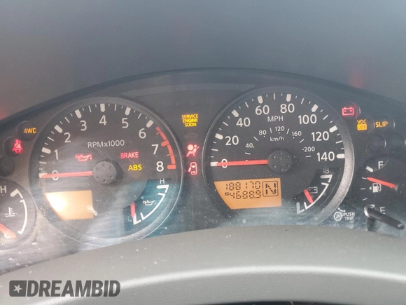 2010 Nissan Frontier Pro-4X with VIN 1N6AD0EV2AC401933, listed as a Copart auction lot 53980575 with 188,170 mi miles and Salvage title. Bid and sale history available at DreamBid. Image 9.