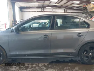 2014 Volkswagen Jetta Sedan S with VIN 3VW2K7AJ5EM410491, listed as a IAAI auction lot 42083614 with 65,960 mi miles. Bid and sale history available at carsss.com. Image 15.