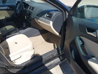 2012 Volkswagen Jetta TDI w/Premium & Nav z VIN 3VWLL7AJ7CM400382, wystawiony jako IAAI lot #42274839 z przebiegiem 150 205 mil mil oraz . Historia ofert i sprzedaży dostępna na DreamBid. Obrazek 5.