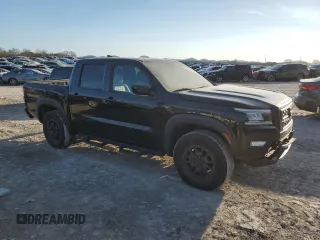 2022 Nissan Frontier Pro-4X with VIN 1N6ED1EK7NN605778, listed as a Copart auction lot 43533205 with 49,132 mi miles and Salvage title. Bid and sale history available at DreamBid. Image 4.