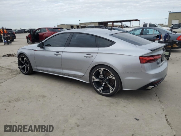 2023 Audi A5 Sportback Premium Plus with VIN WAUCBCF50PA049521, listed as a Copart auction lot 84673214 with 26,493 mi miles and Salvage Title. Bid and sale history available at carsss.com. Image 2.