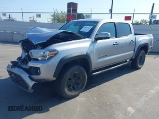 2021 Toyota Tacoma SR with VIN 5TFCZ5AN6MX270972, listed as a IAAI auction lot 42460823 with 76,062 mi miles and . Bid and sale history available at DreamBid. Image 19.