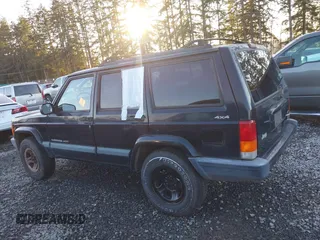 2000 Jeep Cherokee z VIN 1J4FF48S5YL260176, wystawiony jako IAAI lot #41381885 z przebiegiem Nie podano mil oraz . Historia ofert i sprzedaży dostępna na DreamBid. Obrazek 14.