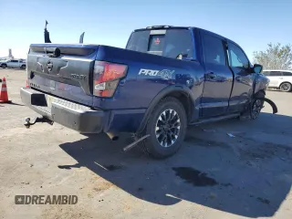 2021 Nissan Titan Pro-4X с VIN 1N6AA1ED1MN510768, выставлен на аукционе Copart как лот 77556484 с пробегом 57 540 миль миль и Списание • Salvage title. История ставок и продаж доступна на DreamBid. Изображение 3.