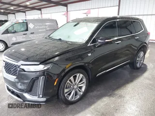 2020 Cadillac XT6 FWD Premium Luxury with VIN 1GYKPCRS9LZ177120, listed as a IAAI auction lot 41608960 with 63,109 mi miles and . Bid and sale history available at DreamBid. Image 2.