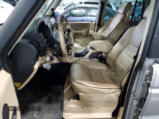 2003 Land Rover Discovery with VIN SALTY16493A801832, listed as a Copart auction lot 58690064 with 125,569 mi miles and Salvage Title. Bid and sale history available at DreamBid. Image 7.