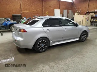2015 Mitsubishi Lancer SE with VIN JA32V2FWXFU026431, listed as a Copart auction lot 55418835 with 164,899 mi miles and Salvage Title. Bid and sale history available at DreamBid. Image 3.