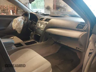 2007 Toyota Camry z VIN JTNBB46K573017707, wystawiony jako IAAI lot #42230423 z przebiegiem 140 843 mil mil oraz . Historia ofert i sprzedaży dostępna na DreamBid. Obrazek 5.