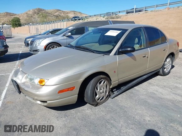 2002 Saturn SL z VIN 1G8ZK52722Z103373, wystawiony jako IAAI lot #41681684 z przebiegiem 109 389 mil mil oraz . Historia ofert i sprzedaży dostępna na DreamBid. Obrazek 2.