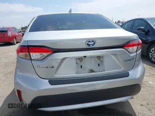 2022 Toyota Corolla Hybrid LE with VIN JTDEAMDE6NJ056705, listed as a IAAI auction lot 42032119 with 197,030 mi miles. Bid and sale history available at carsss.com. Image 16.