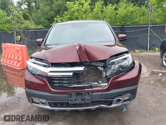 2019 Honda Ridgeline RTL-E with VIN 5FPYK3F78KB004781, listed as a IAAI auction lot 42425646 with 147,695 mi miles and . Bid and sale history available at DreamBid. Image 12.