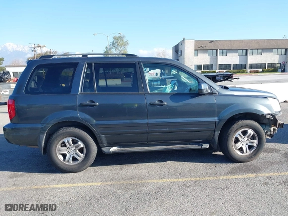 2003 Honda Pilot EX with VIN 2HKYF18633H599550, listed as a IAAI auction lot 41813549 with 242,103 mi miles. Bid and sale history available at carsss.com. Image 14.