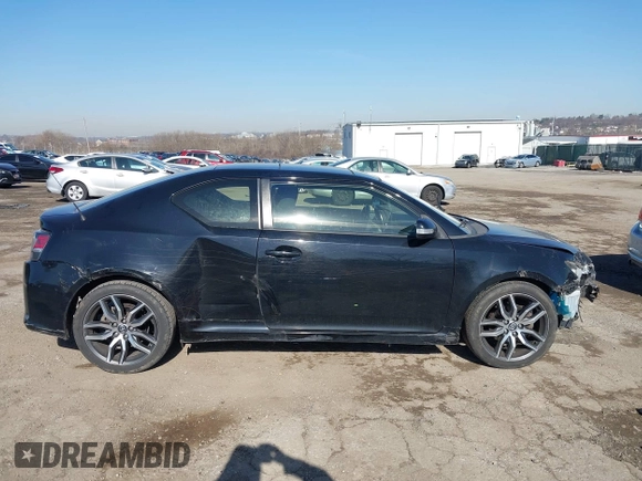 2014 Scion tC with VIN JTKJF5C78E3074094, listed as a IAAI auction lot 41828785 with 164,976 mi miles. Bid and sale history available at carsss.com. Image 6.