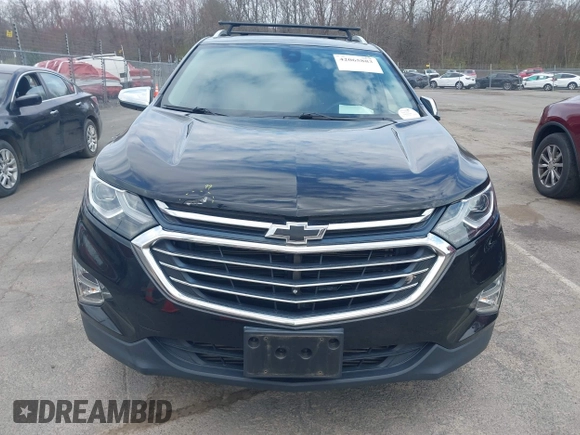 2018 Chevrolet Equinox Premier with VIN 2GNAXWEX6J6302935, listed as a IAAI auction lot 42065883 with 61,983 mi miles and . Bid and sale history available at carsss.com. Image 12.