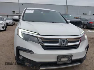 2020 Honda Pilot EX-L with VIN 5FNYF5H55LB029238, listed as a IAAI auction lot 41330490 with 116,787 mi miles. Bid and sale history available at carsss.com. Image 12.